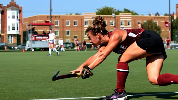 Junior Midfielder Paige Gross sends the ball back into play in the Owls’ 3-2 win against Saint Joseph’s Sept. 7. The Owls are 2-4 this season. | Geneva Heffernan TTN