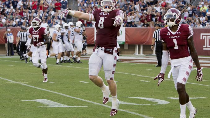 Tyler Matakevich (center) and Tavon Young celebrate during the Owls 17-point victory against Penn State Saturday at Lincoln Financial Field. It was the first time Temple defeated the Nittany Lions since 1941. | Jenny Kerrigan TTN