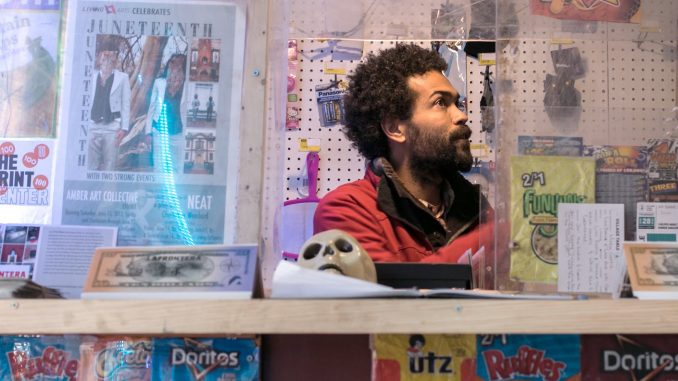 Keir Johnston, one of the co-founders of the “La Frontera,” sits in the bodega created with the goal of building a stronger bond in the North Philadelphia community. | JD Mousley TTN