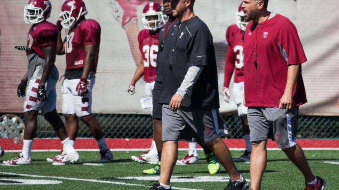 Coach Matt Rhule (right) and offensive coordinator Marcus Satterfield walk on Chodoff Field during a recent practice. | Daniel Rainville TTN