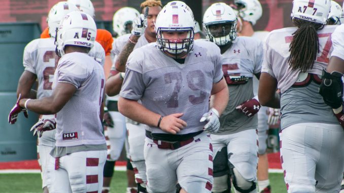 Senior center Kyle Friend runs off the field during an Owls’ practice Sept. 29 at Chodoff Field. The Owls have allowed six sacks in the team’s first four games. | JD Mousley TTN