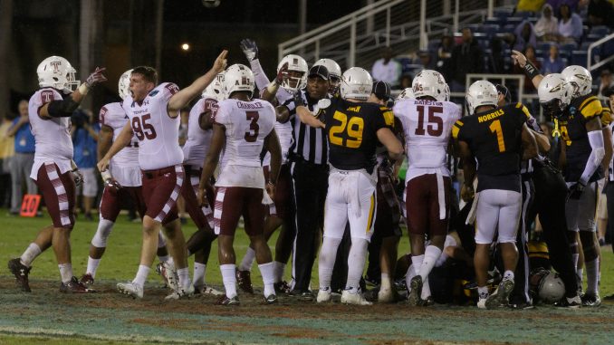 Redshirt-senior kicker Tyler Mayes (No. 95) signals after Temple's onside kick attempt in the team's 32-17 loss to Toledo in the Marmot Boca Raton Bowl Nov. 22| Donald Otto