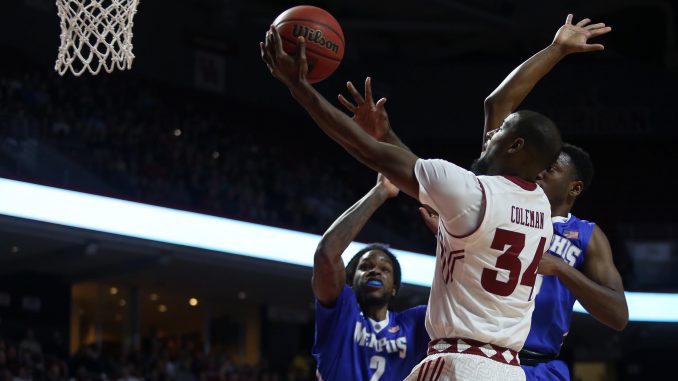 Senior guard Devin Coleman attempts a layup in the Owls' 72-62 win against Memphis on Thursday at the Licouras Center. | Jenny Kerrigan TTN