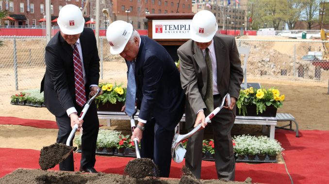 President Neil Theobald (left), Board of Trustees Chairman Patrick O'Connor and Dean of Libraries Joe Lucia symbolically break ground at the construction site for the new library. | EVAN EASTERLING TTN