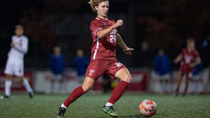 George Medill playing soccer for Temple